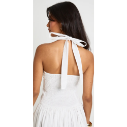 Cotton poplin maxi dress with halter neck, pleated front hem, and skater style